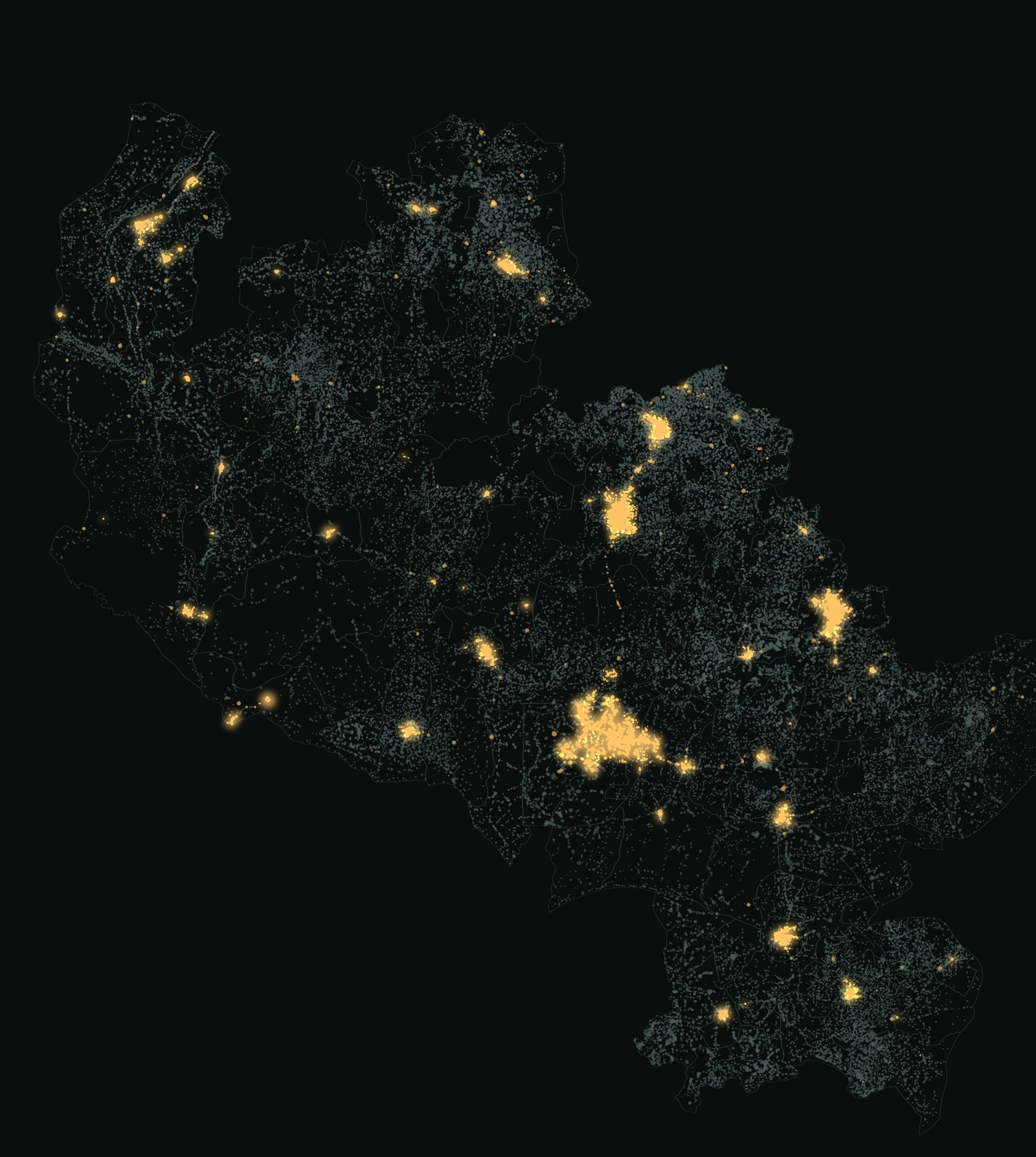 Map of 76,995 named villages across eight Nigerian states: a few amber clusters of light around the cities, most villages dark